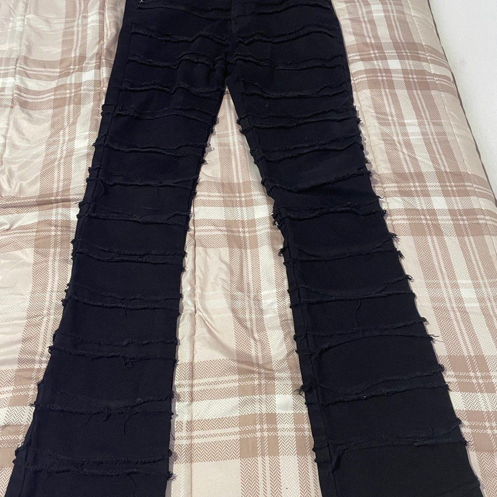Black stacked jeans